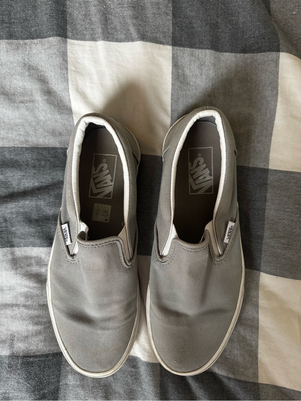 Gray slip on vans